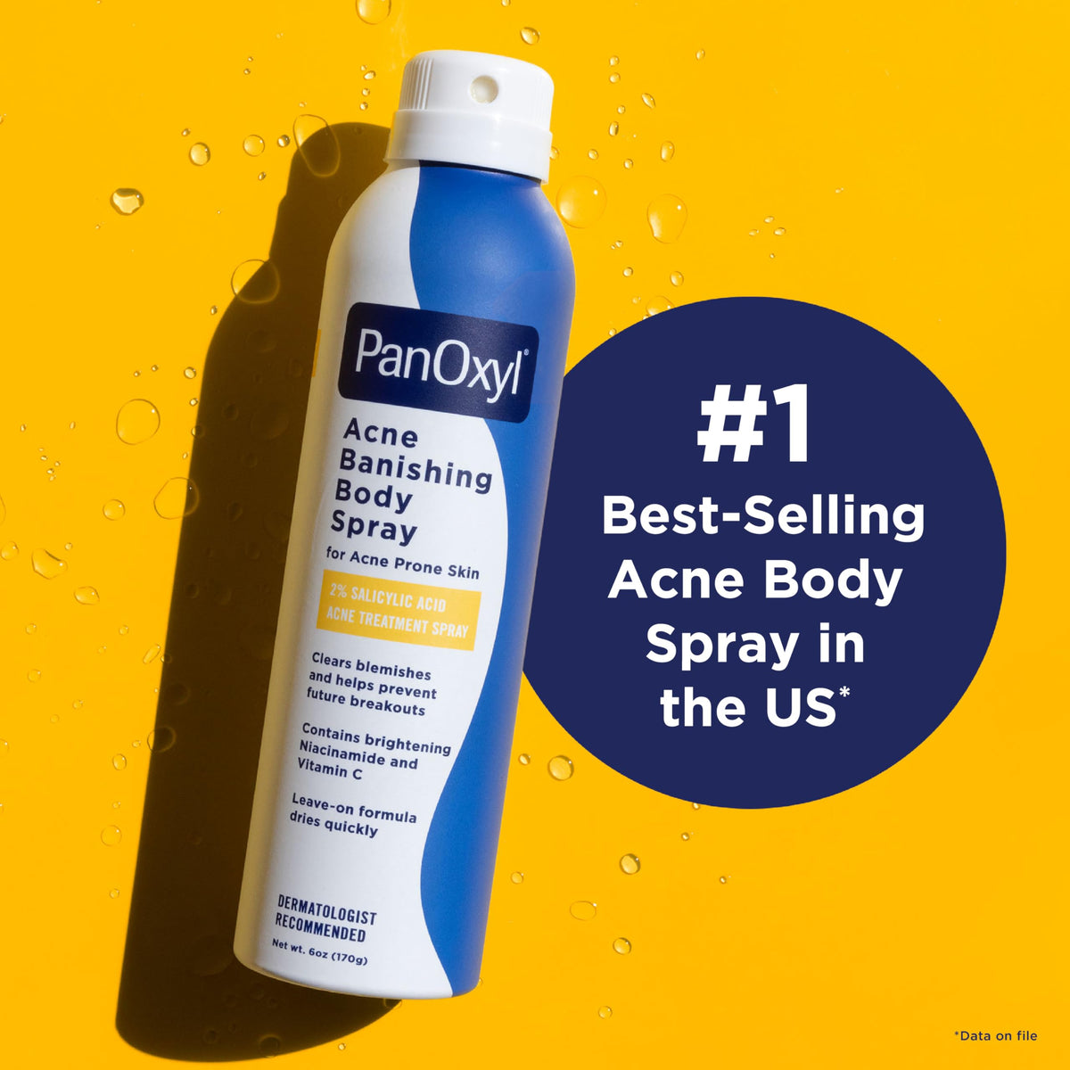 PanOxyl spray applied to upper back demonstrating effortless application