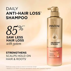 Pantene dispensing shampoo foam from bottle demonstrating gentle cleansing benefit