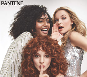 Pantene applying cream to damp hair demonstrating easy styling