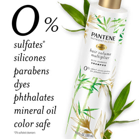 Pantene bottle in hand for size comparison and travel-friendly benefit