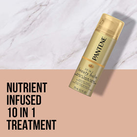 Pantene balm applied to hand showing texture and quick absorbency for smooth hair