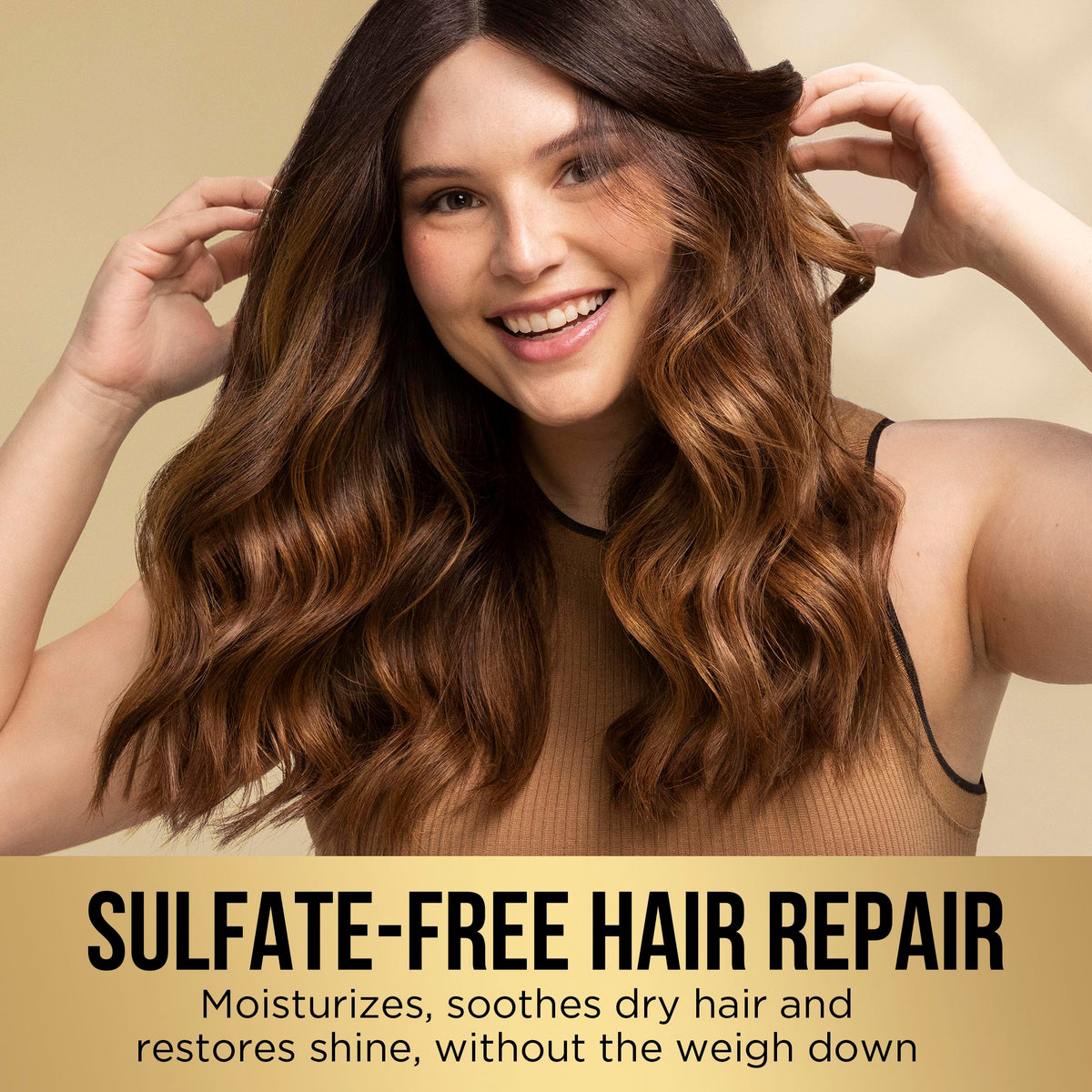 Pantene conditioner being applied to ends showing detangling benefit