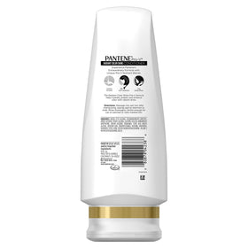 Pantene conditioner pouring to show rich creaminess and hydration benefits