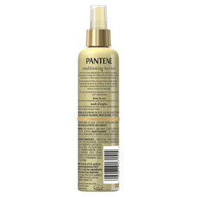 Pantene spray nozzle close-up demonstrating fine mist for even, non-greasy coverage