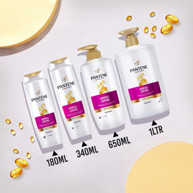 After-use smooth hair styled in a lifestyle setting to show frizz reduction and manageability