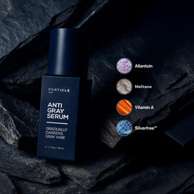 Particle serum texture drop on hand close-up showing lightweight absorbent formula