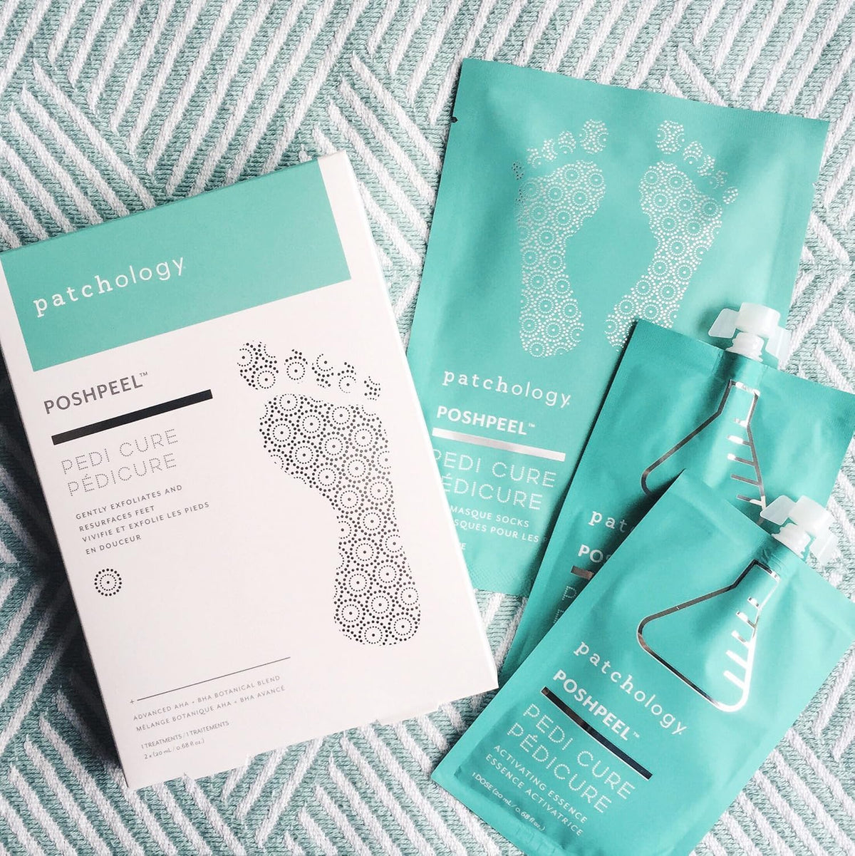 Patchology booties worn on feet during treatment demonstrating easy at-home use
