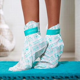 Patchology open booties and single-use sachet laid out for treatment convenience
