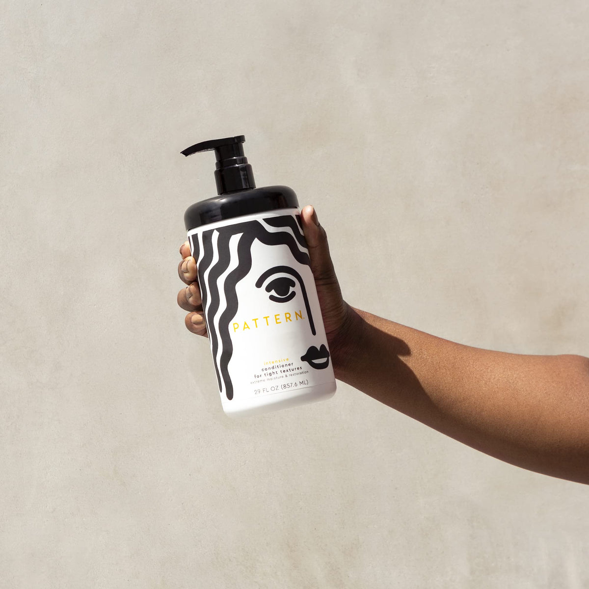PATTERN applied to wet curly hair demonstrating detangling benefit