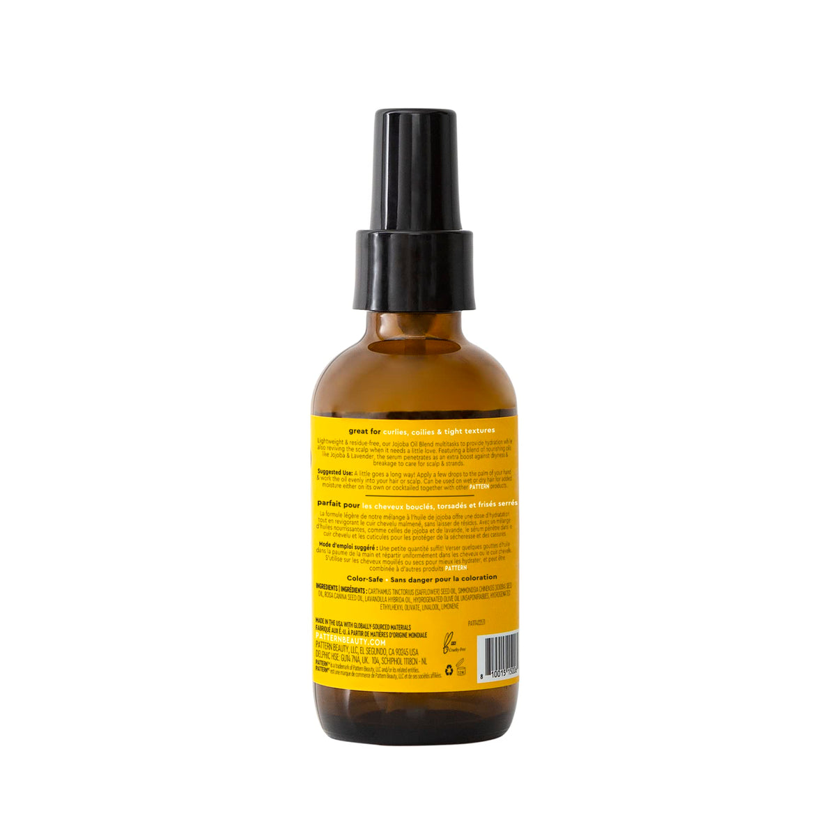 PATTERN applying serum to curls to smooth frizz and enhance definition without weighing hair down