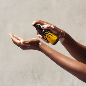 PATTERN jar of safflower, jojoba, rosehip, olive and lavender oils emphasizing natural blend benefits