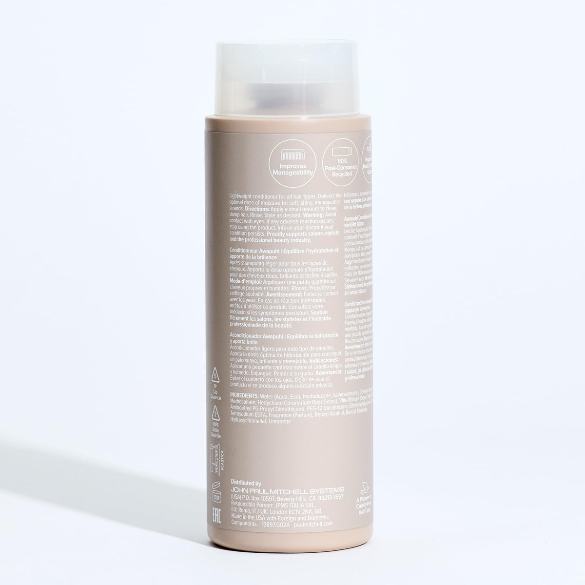 Paul Mitchell conditioner on bathroom shelf in styled routine
