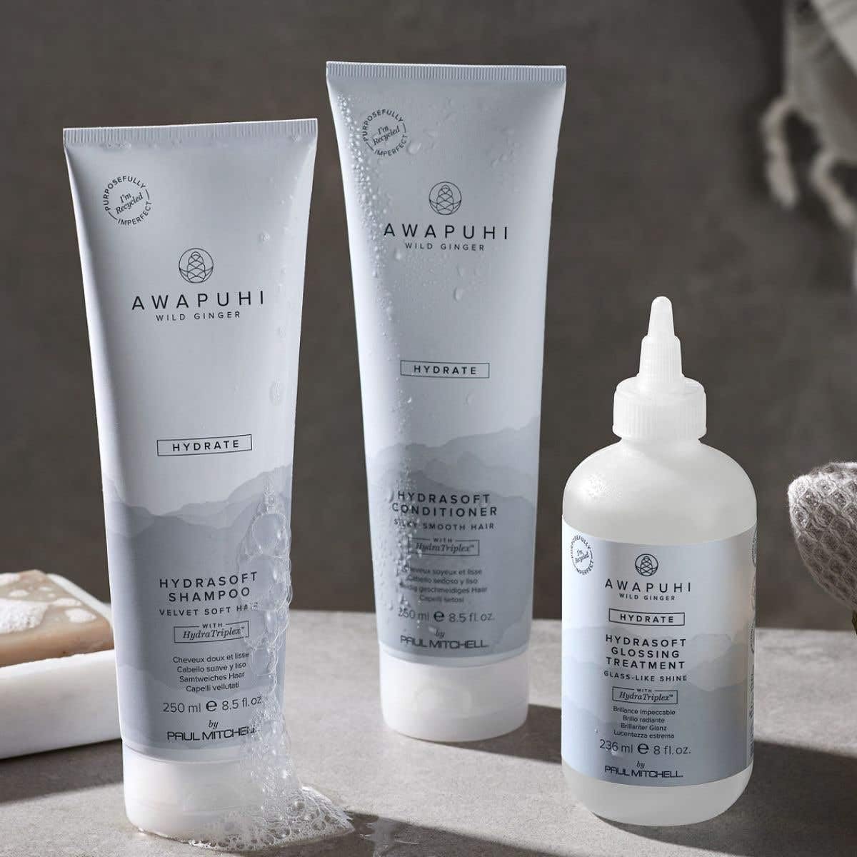 Bathroom shelf with Paul Mitchell Awapuhi Wild Ginger bottle illustrating salon-quality routine