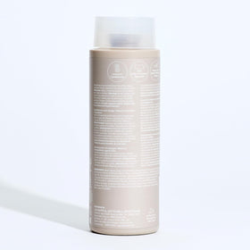 Paul Mitchell on bathroom shelf in lifestyle scene showing everyday use benefit