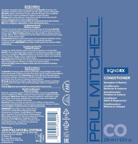 Paul Mitchell conditioner staged in bathroom for salon-quality home routine