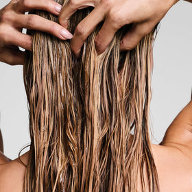 Paul Mitchell pouring conditioner illustrating easy application and control