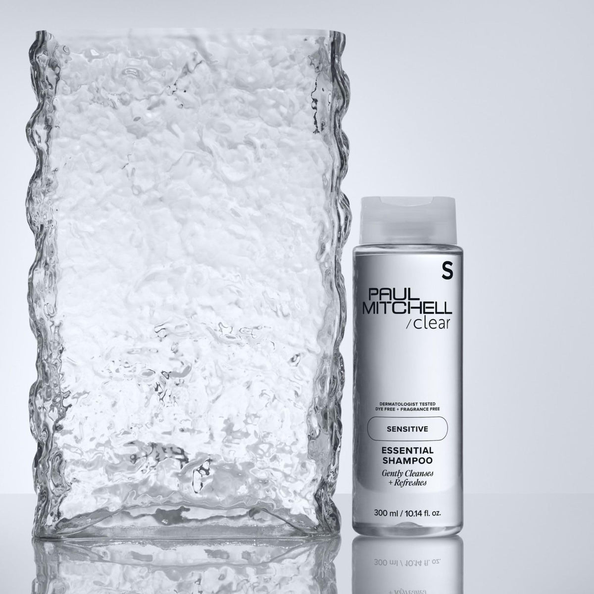 Paul Mitchell bottle close-up of recycled packaging materials for sustainability