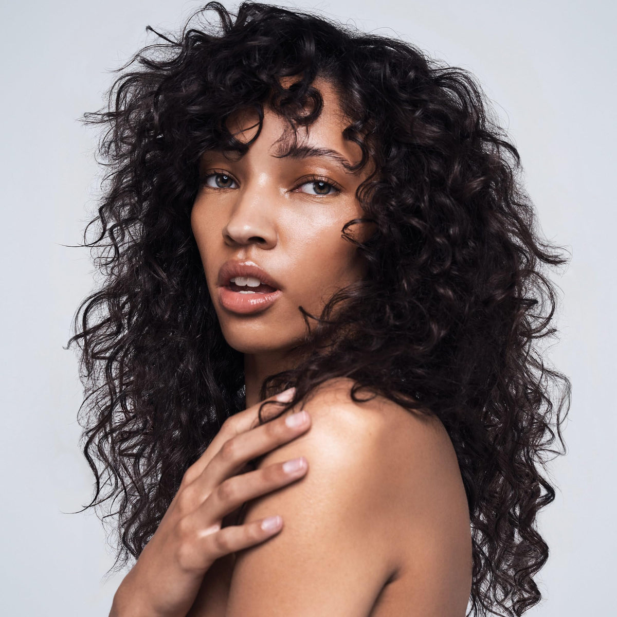 Paul Mitchell glaze in hair showing natural separation and soft hold