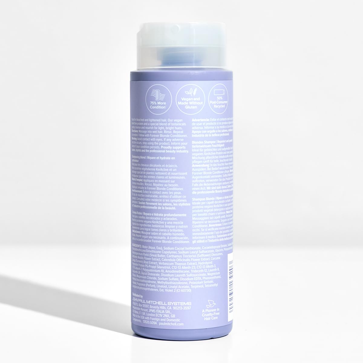 Paul Mitchell retail bottle detail highlighting PCR packaging and recyclability