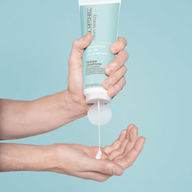 Paul Mitchell pump and label detail highlighting clean-beauty packaging and easy dispensing