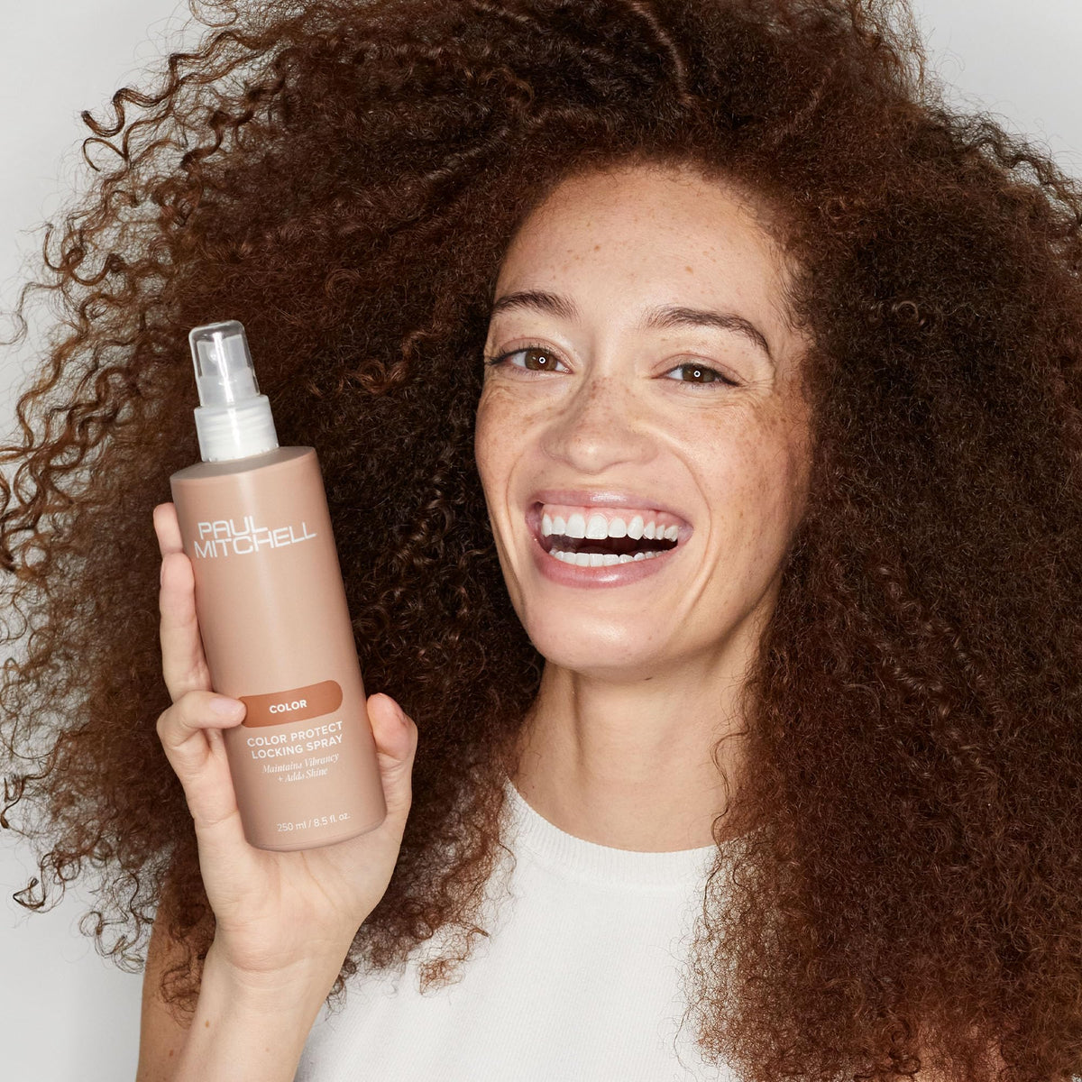 Paul Mitchell label close-up highlighting sunflower extract benefit