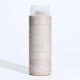 Paul Mitchell product on bathroom counter in styling scene inspiring everyday use