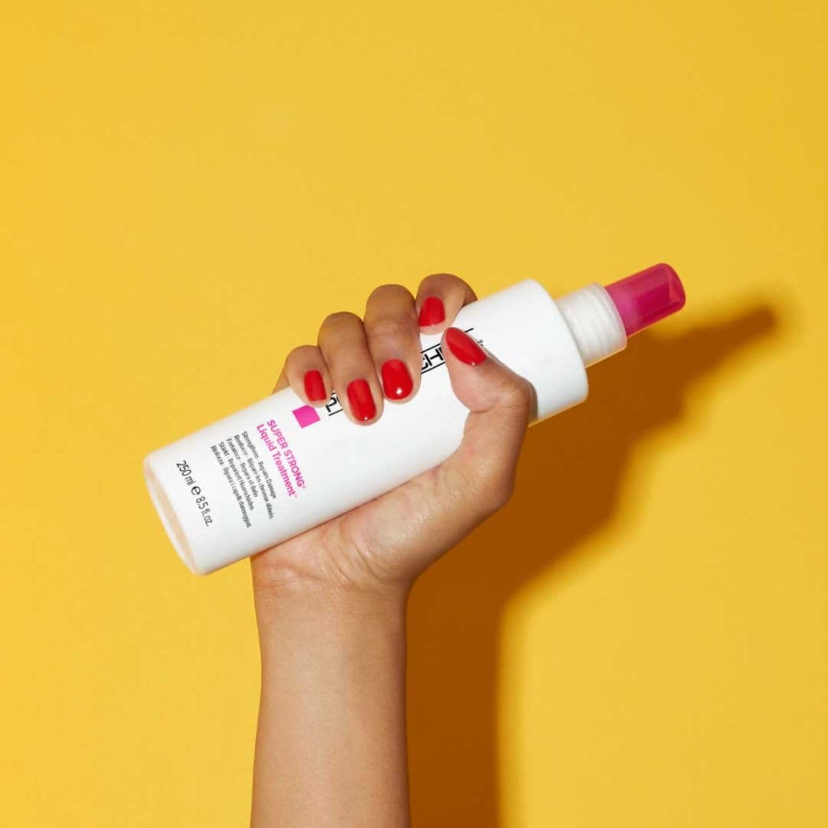 Paul Mitchell spray nozzle close-up illustrating easy application and even mist