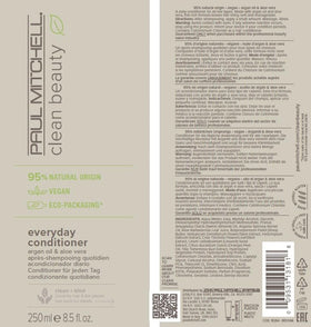 Paul Mitchell open bottle dispensing conditioner to show product flow and easy application benefit