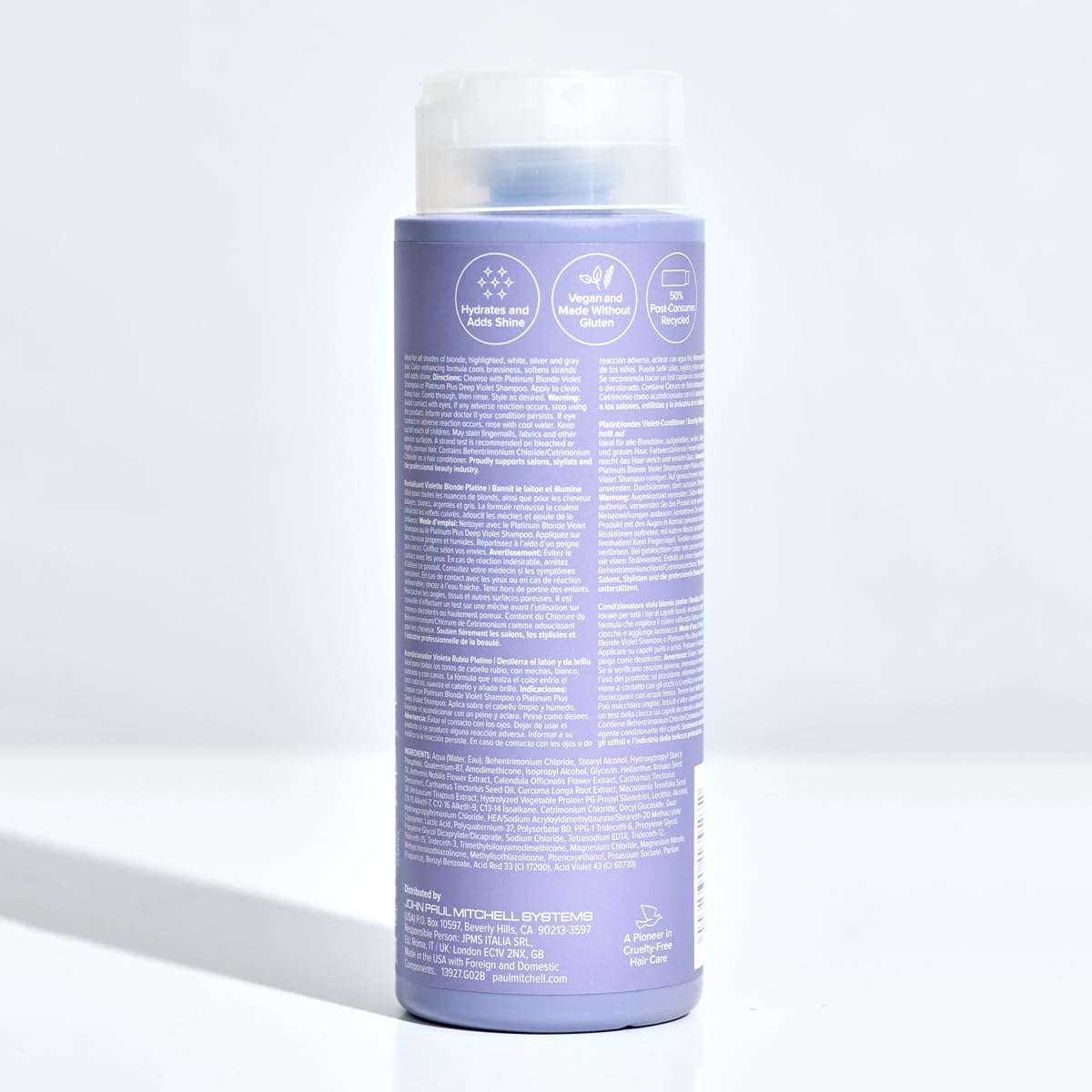 Paul Mitchell bottle styled on bathroom shelf in lifestyle scene promoting salon-quality at home