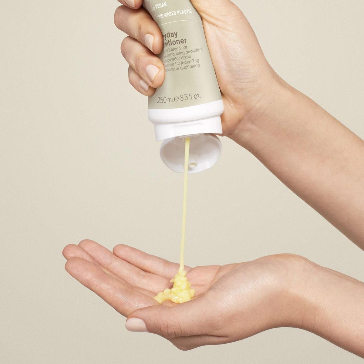 Paul Mitchell focus on pump and cap detail highlighting easy dispensing and sustainable packaging benefit