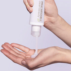 Paul Mitchell cap and pump close-up showing dispensing control
