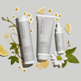 Paul Mitchell ingredients display grapevine sap and chamomile to show soothing benefit
