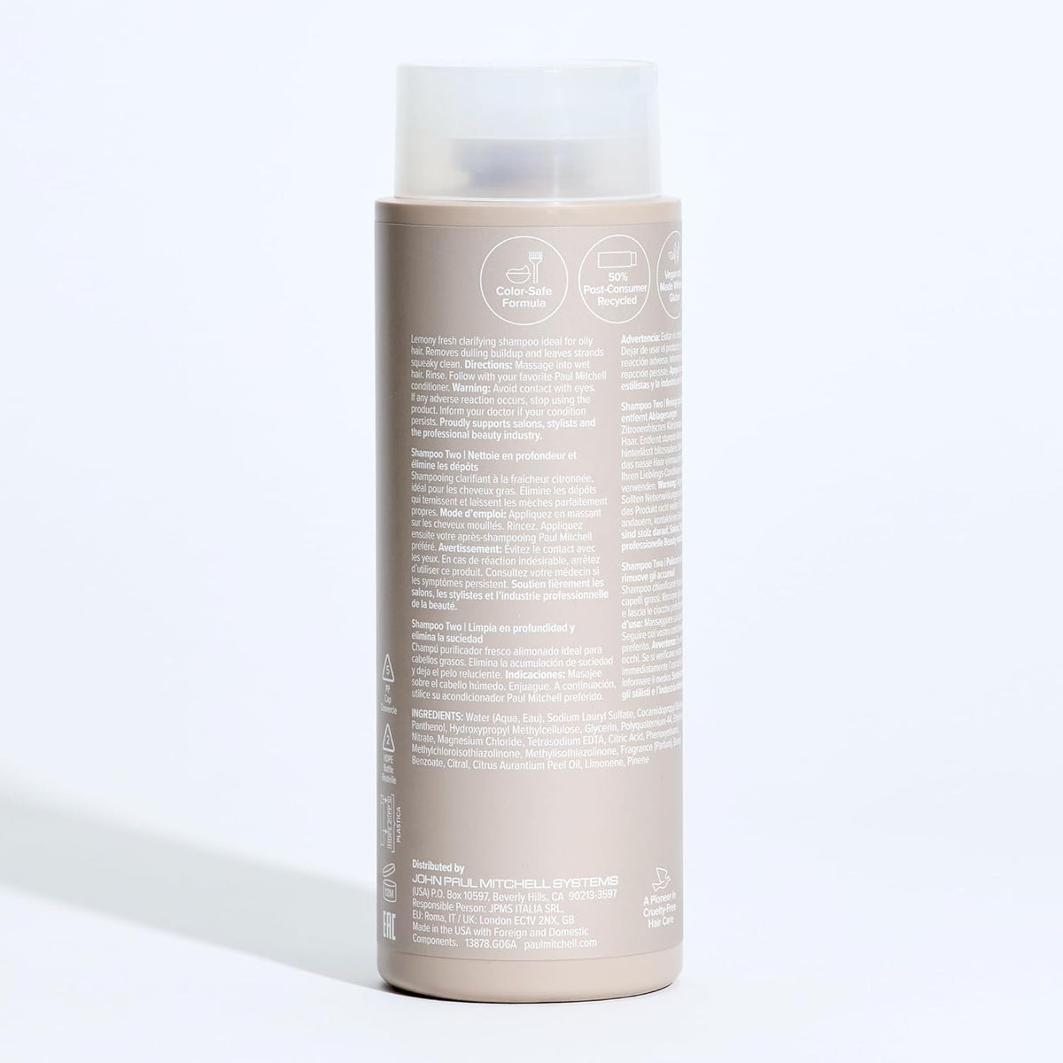 Stylist applying Paul Mitchell Shampoo Two in salon showing effective cleanse benefit
