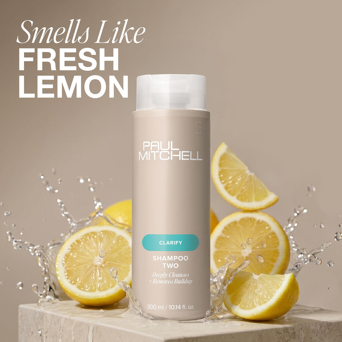 Paul Mitchell bottle held in hand showing size and professional salon value benefit