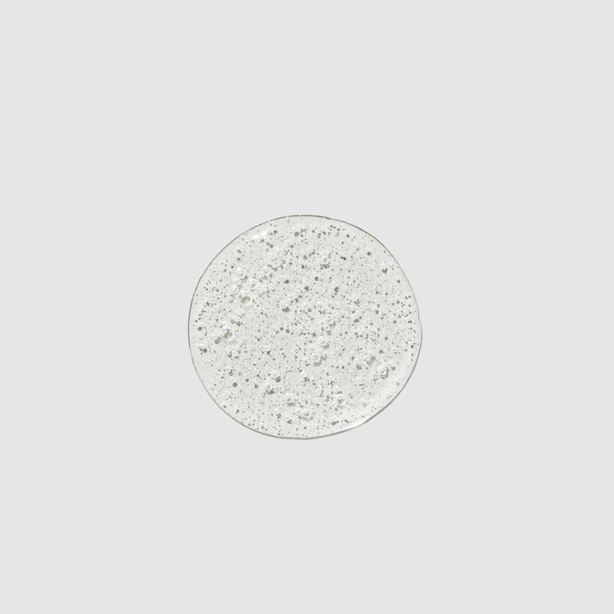 Paul Mitchell Super Strong dispensing foam from pump illustrating gentle lather benefit