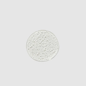 Paul Mitchell Super Strong dispensing foam from pump illustrating gentle lather benefit