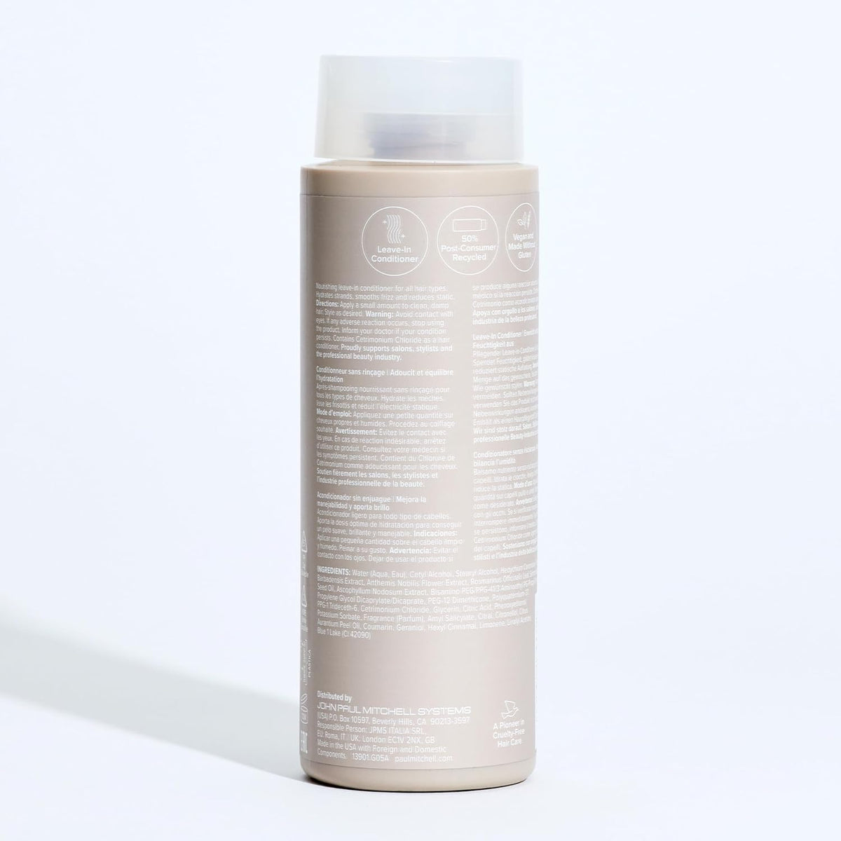 paul mitchell bottle in lifestyle setting with styled hair showing manageability benefit