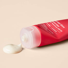 Paula's Choice tube in hand for size comparison and portable skincare benefit