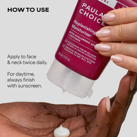 Paula's Choice moisturizer applied to hand demonstrating smooth absorption
