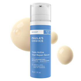 Paula's Choice bottle held in hand showing 1 fl oz scale and travel-friendly benefit