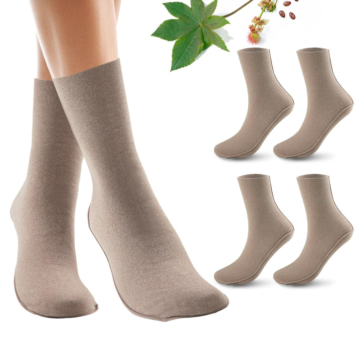 Paw Legend front packaging showing two khaki castor oil foot wraps and reusable benefit