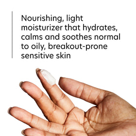 PCA SKIN moisturizer dabbed on hand demonstrating easy application and quick absorbency