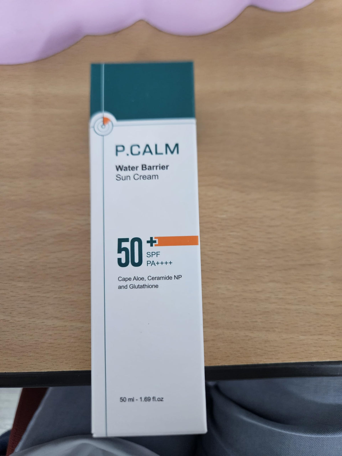 P.CALM tube next to ruler showing 3.4 fl oz size clarity