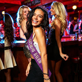 PcwBcn sash worn over dress demonstrating flattering fit and celebratory shimmer