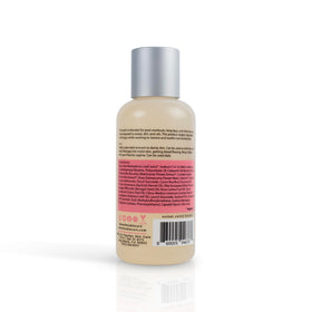 Peaches Skin Care pump close-up with creamy texture, illustrating gentle non-drying foam