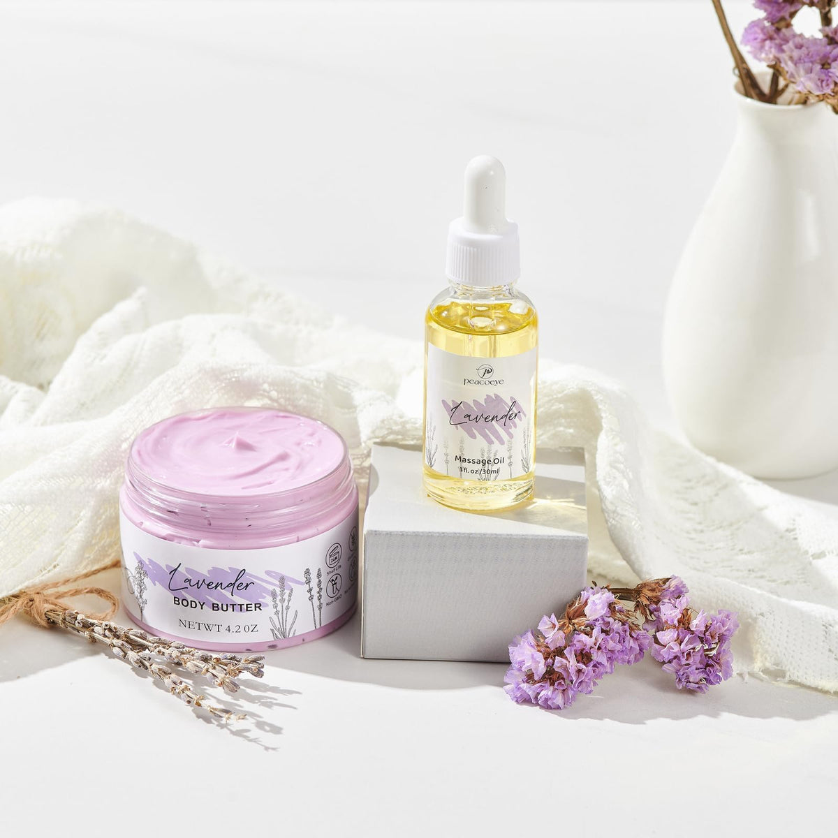 peacoeye body butter and hand cream arranged to show moisturizing benefits