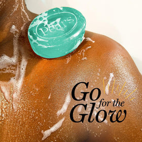 Pears soap in hand producing wet lather, demonstrating gentle cleansing benefit