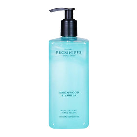 Pecksniff's front bottle shows sandalwood vanilla scent and elegant design benefit