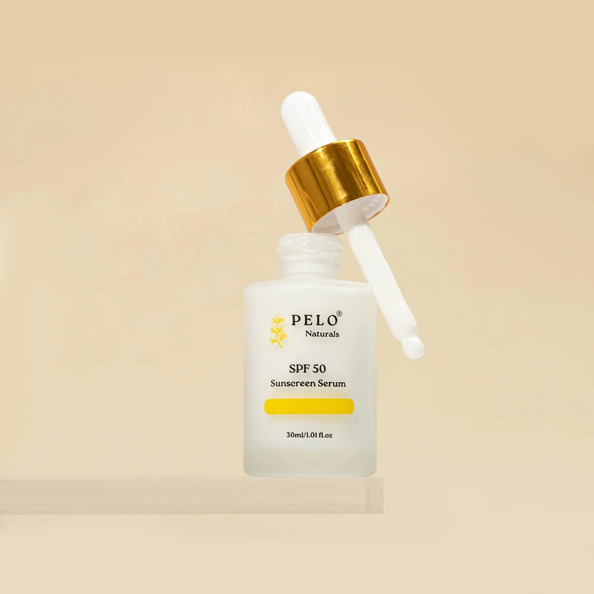 PELO Naturals bottle with squalane and niacinamide highlighting hydration benefits