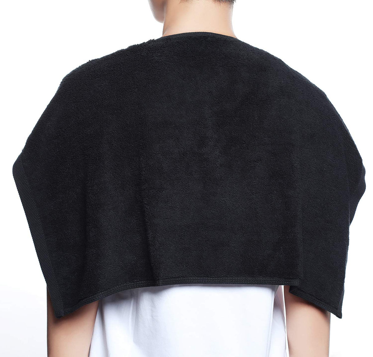 PERFEHAIR towel beside hand to show 16x27 inch scale and convenient portability